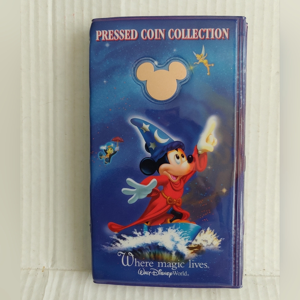 Walt Disney World Magic Mickey pressed coin collection book includes 63 pennies